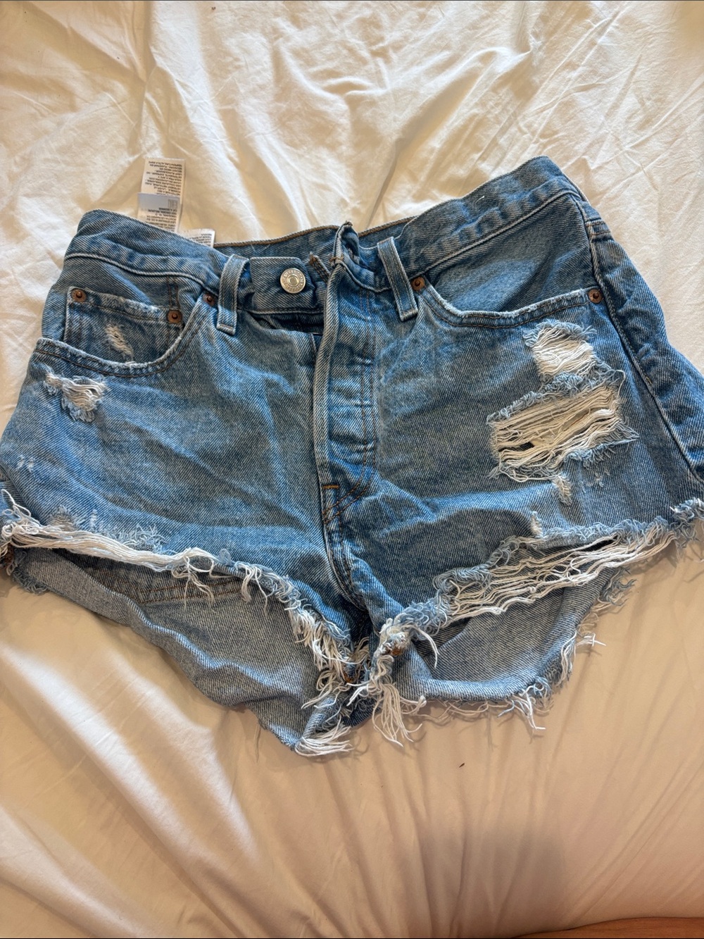 Levi's Medium Blue Distressed Denim Cutoff Shorts